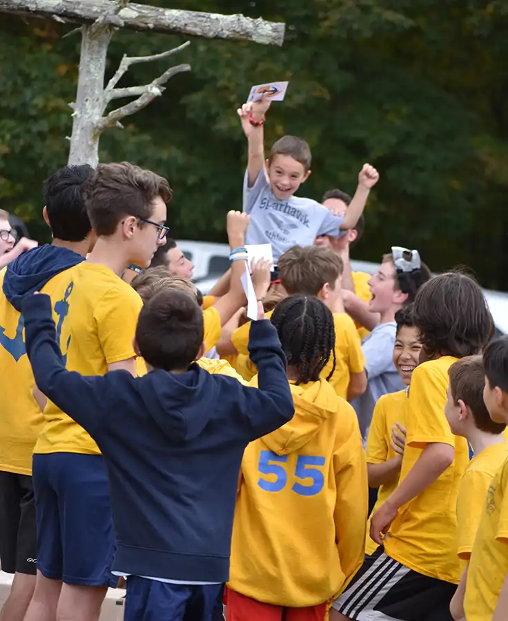 Boy held high in victory