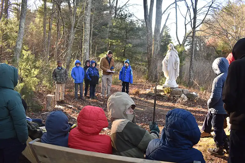 Boys outside prayer with Madonna