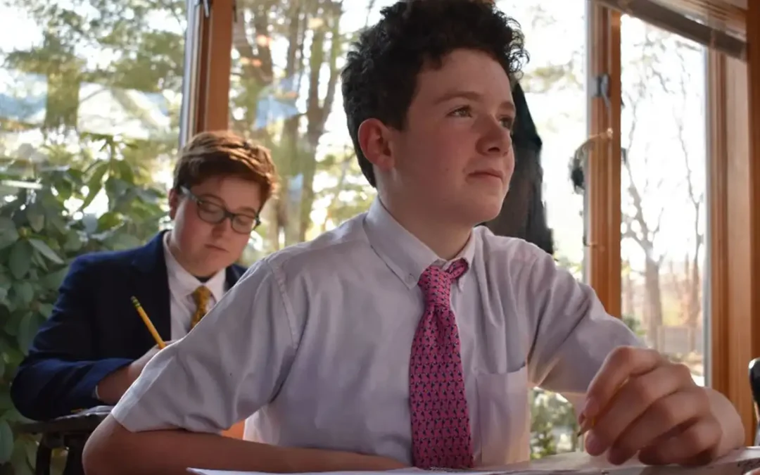 Two high school male students in class