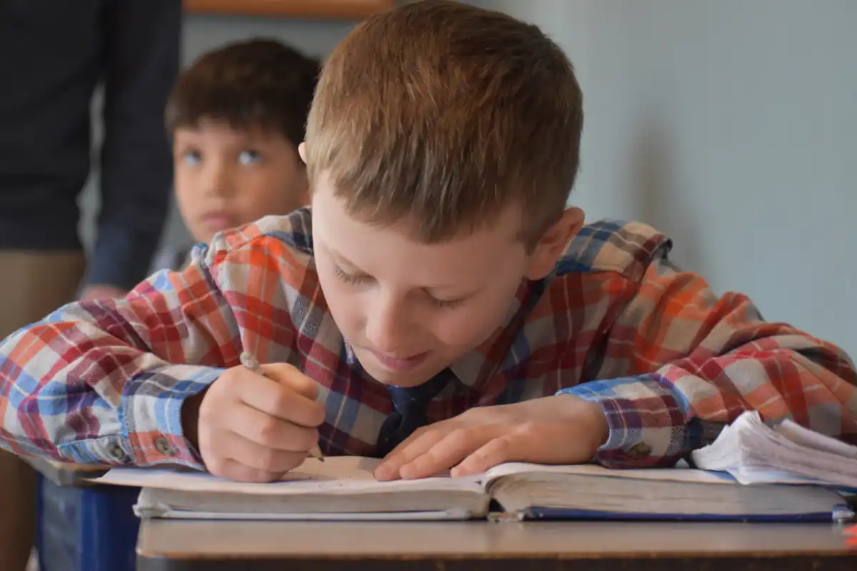 Third-grade student working on math