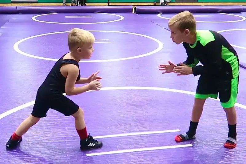 two boys wrestling